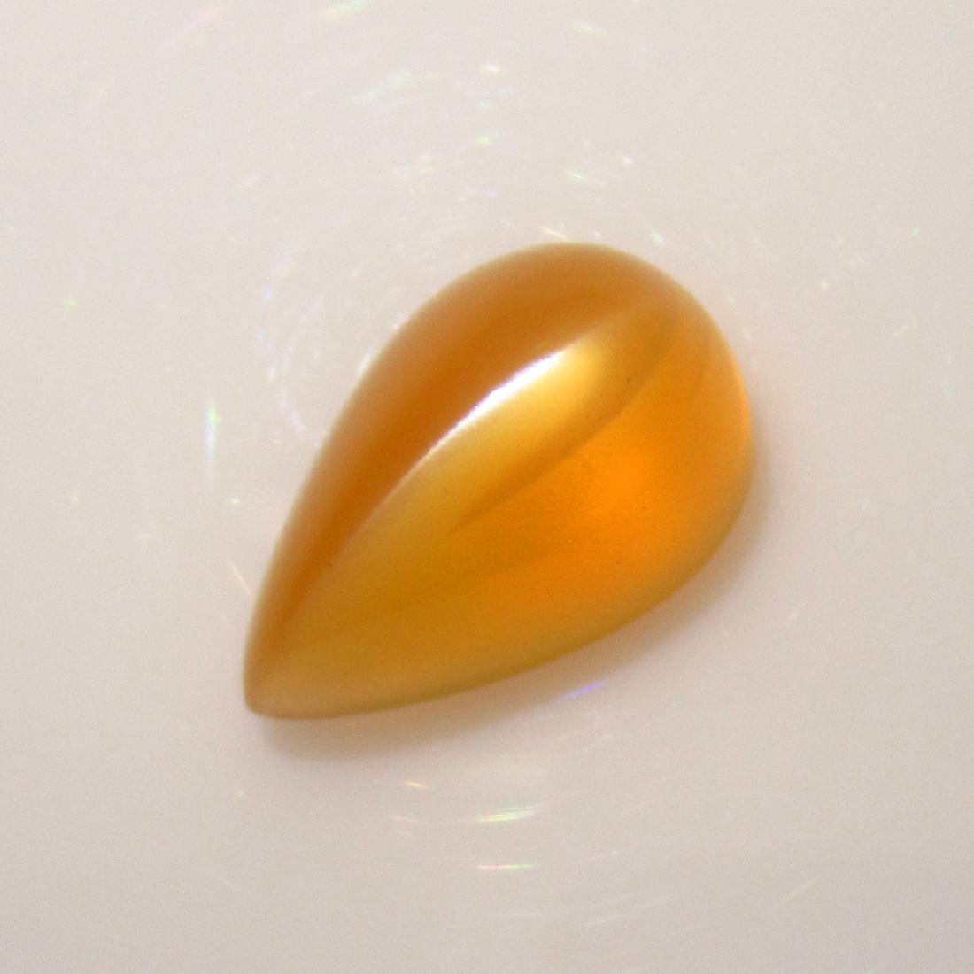 5.32 Ctw Natural Moonstone Catseye 14X9 mm Pear Cab: No Reserve! Title: 5.32 Ctw Natural Moonstone Catseye 14X9 mm Pear Cab Stone Clarity: Transparent Gemstones: Moonstone Catseye Carat Weights: 5.32 Size/Dimensions: 14.00 x 9.10 x 7.20 mm Additional In