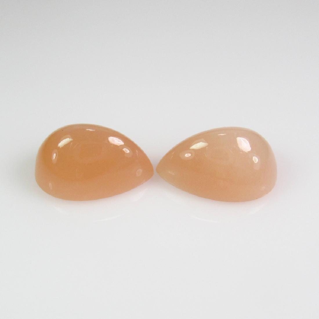 7.32 Ctw Natural Milky Brown Moonstone 12X8 mm Pear: No Reserve! Title: 7.32 Ctw Natural Milky Brown Moonstone 12X8 mm Pear Pair Stone Clarity: Opaque Gemstones: Moonstone Carat Weights: 2.81 Size/Dimensions: 12.10 x 8.00 x 6.50 mm / 2 PC's Additional I