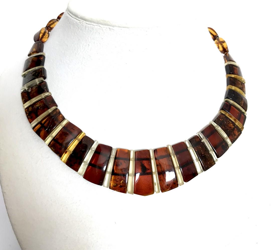 Collar cut Baltic amber necklace 44cm: Title: Collar cut Baltic amber necklace 44cm Gemstone: Baltic amber Weight: 23 grams Size: 25mm x 44cm Additional Information: colour: cherr and lemon Reserve: $130.00 Shipping: Worldwide: Flat-