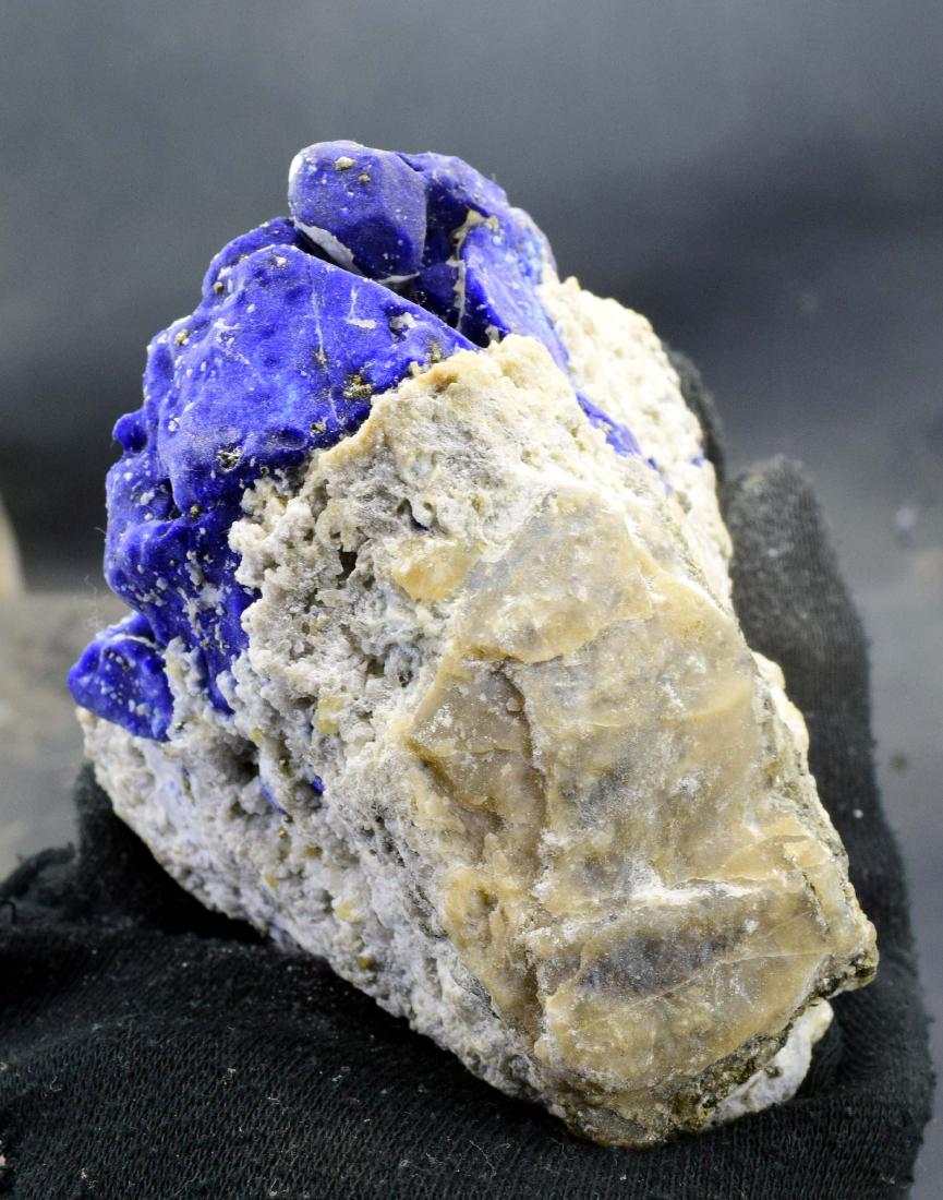 596 Gram Fantastic Royal Blue Lazurite Specimen with: 595 Gram Fantastic Royal Blue Lazurite Specimen with Golden Pyrite & Phlogopite Weight : 595 Gram Size : 95*81*70 mm Treatment : Natural origin : Afghanistan Standard DHL Shipping; 595 Gram Fantastic 