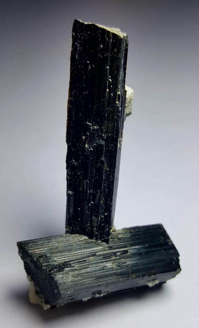 27.87 grams SUPREME QUALITY BLACK TOURMALINE TERMINATED: Title: 27.87 grams SUPREME QUALITY BLACK TOURMALINE TERMINATED CRYSTALS WITH ALBITE Origin: Pakistan Weight: 27 Grams Reserve: $25.00 Shipping: Domestic: Flat-rate of $23.00 to anywhere within the co
