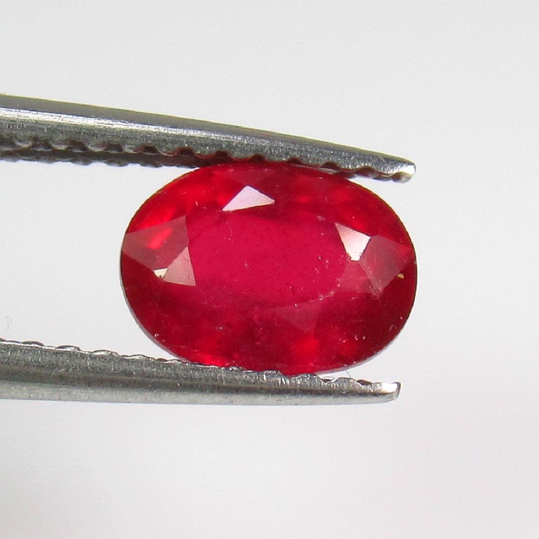 1.46 Ct Genuine Mozambique Red Ruby 7X5 mm Oval Cut (1 of 2)