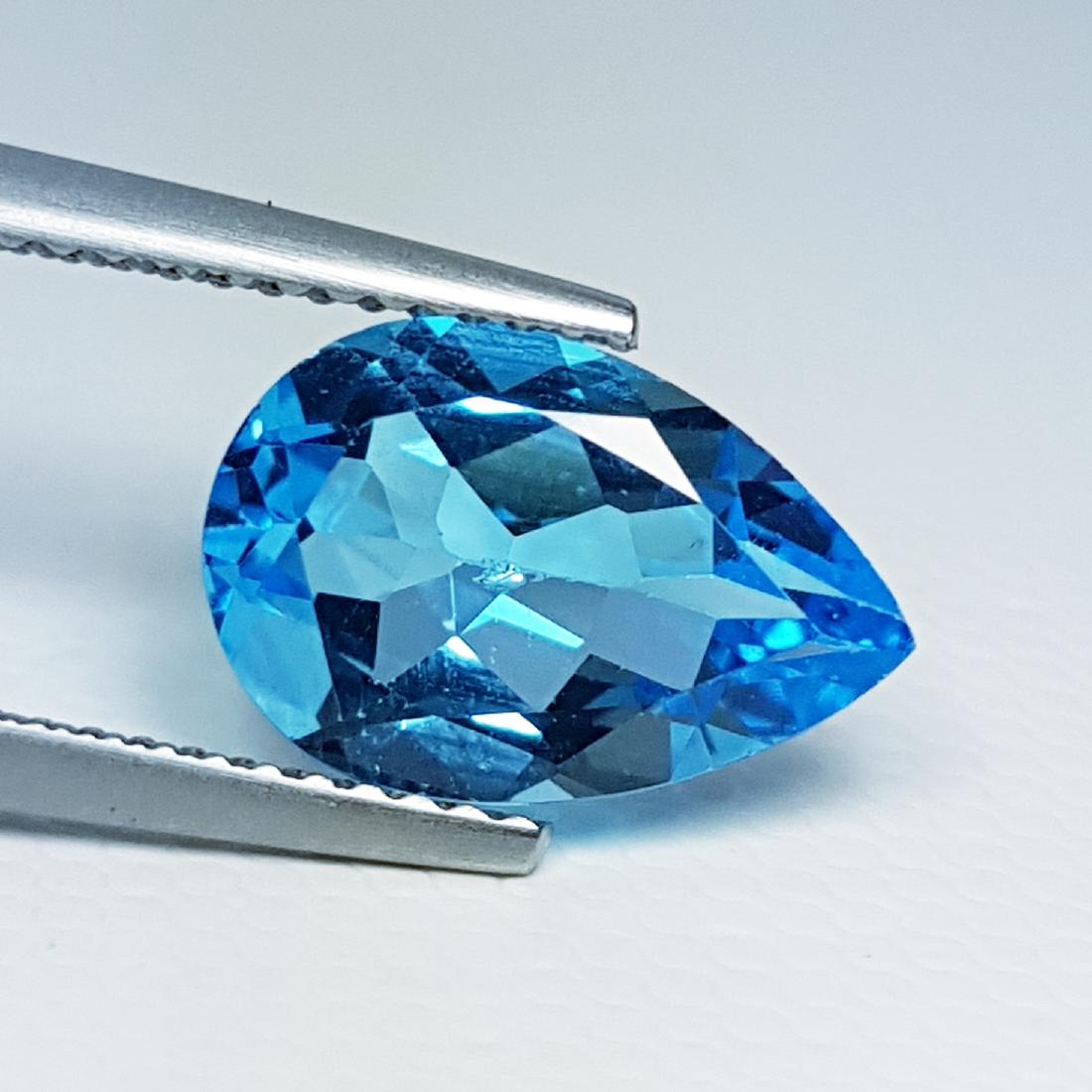 3.30 ct Top Luster Gem Pear Cut Natural Blue Topaz: No Reserve! Title: 3.30 ct Top Luster Gem Pear Cut Natural Blue Topaz Color/Clarity: VVS Gemstones: Gemstones Carat Weights: 3.3 Size/Dimensions: 12.00 x 8.00 x 4.90 Additional Information: Pear - Bra