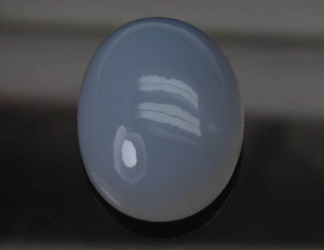 16.16 Ct Natural Chalcedony: No Reserve! Gemstone : Chalcedony Weight in carats : 16.16 Shape and cut : Oval Cabochon Measurements : 19.8x14.9x7.3 mm Treatment : None Color : Blue Origin : Africa Transprancy : Transparent Clarity