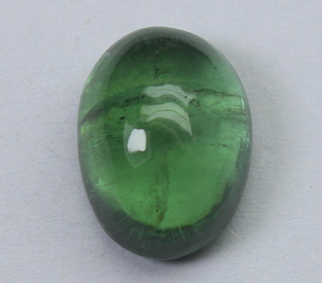 6.50 Ct Natural Green Apatite: No Reserve! "Gemstone : Natural Apatite Shape : Oval Cabochon Measurements : 12.4x9.2x6.3 mm Weight : 6.50 Carat Color : Green Transparency : Transparent Clarity: natural inclusions visible to eyes