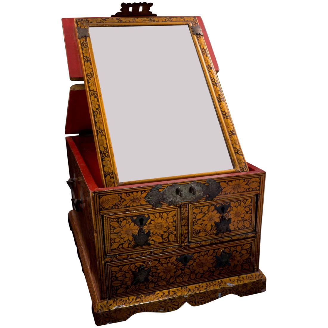 Antique Chinese Gold Lacquered Wooden Mirror Box with: Title: Antique Chinese Gold Lacquered Wooden Mirror Box with Drawers Late 19th Century Size: 12 5/8" long x 9 ½" wide x 7 ½" tall (closed). 15 ¼" tall open. A gold glittering Chinese piece of furni