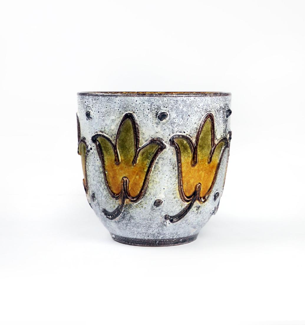 Large Italian Ceramic Planter: A large hand painted ceramic planter in the style of Bitossi, Raymor, and Rosenthal Netter. White lava glaze over a dark base glaze with applied flowers and decorative elements. Beautifully hand paint