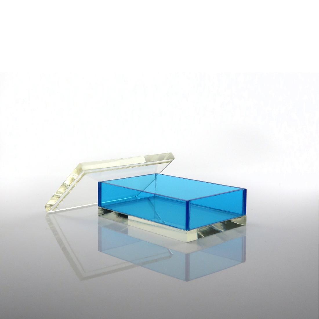 Vintage Blue & Clear Lucite Box: A mid-century lucite box with clear lid and base and blue lucite sides. Perfect for a candy bowl, a vide pouche, a table top object, or as a decorative dish. In excellent vintage condition with wear c