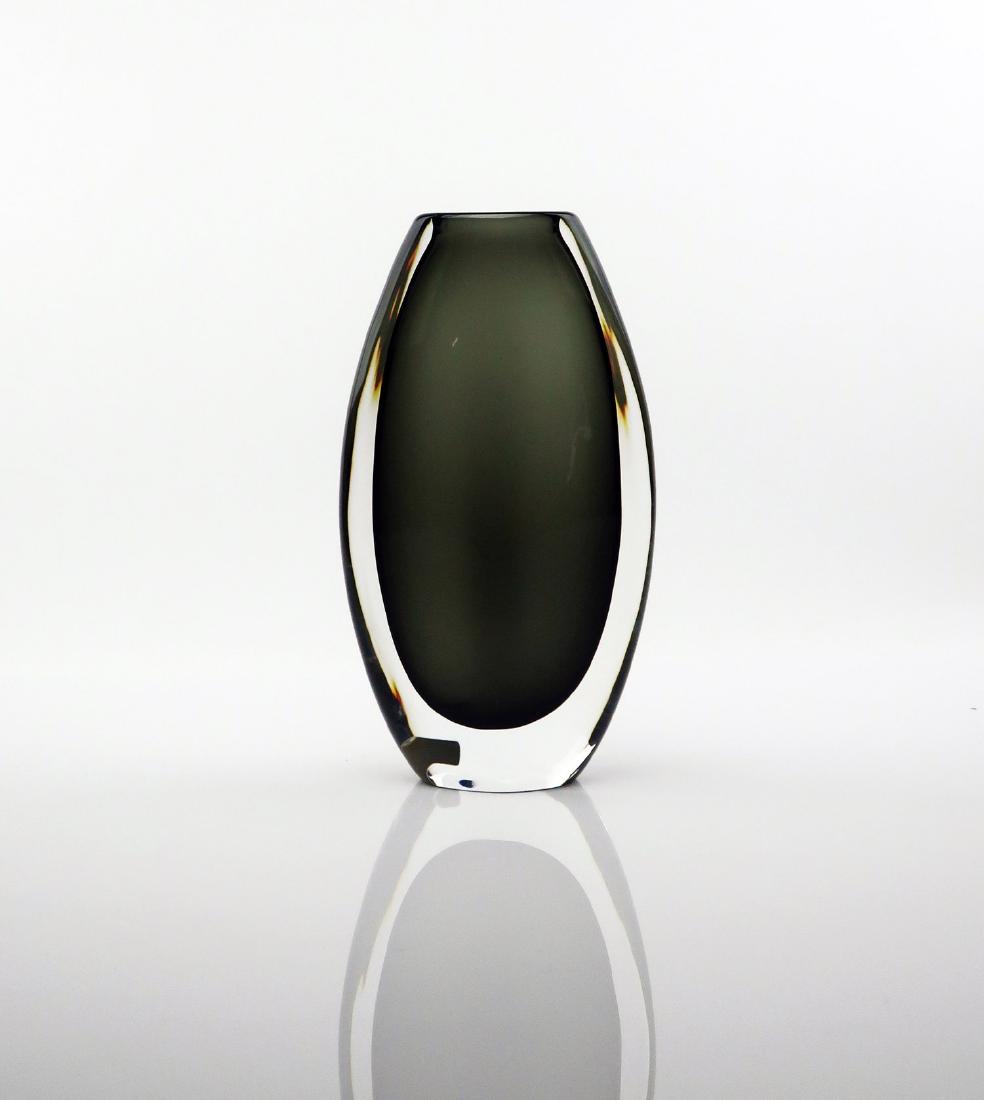 Smoked Glass Vase by Nils Landberg for Orrefors: A smoked glass vase designed by Nils Landberg for Orrefors. Showcases beautifully with a smokey interior enveloped by an outer translucent layer that creates an almost floating appearance. And has a p