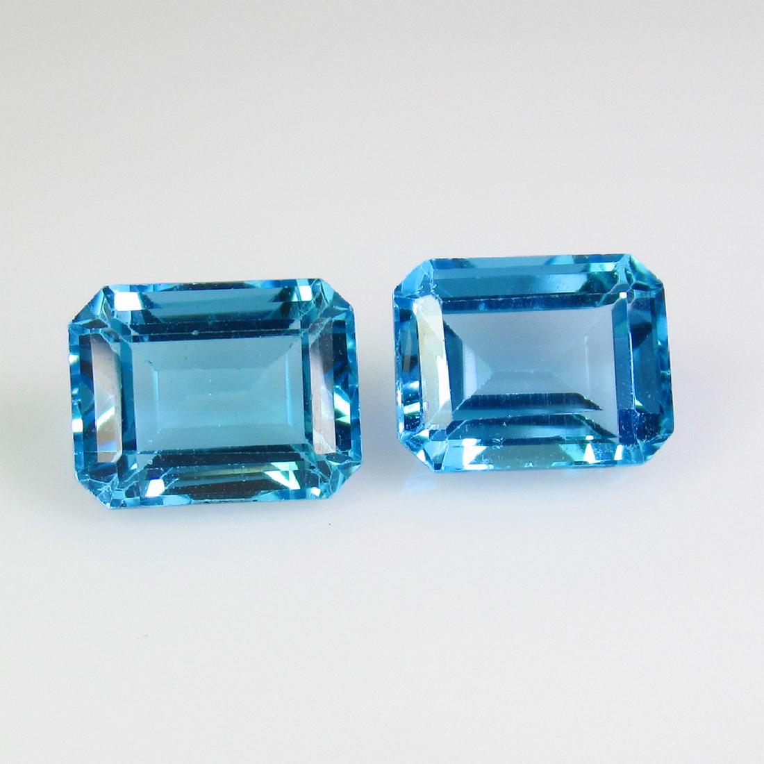 6.07 Ct Genuine Swiss Blue Topaz 9X7 mm Emerald Cut (1 of 2)