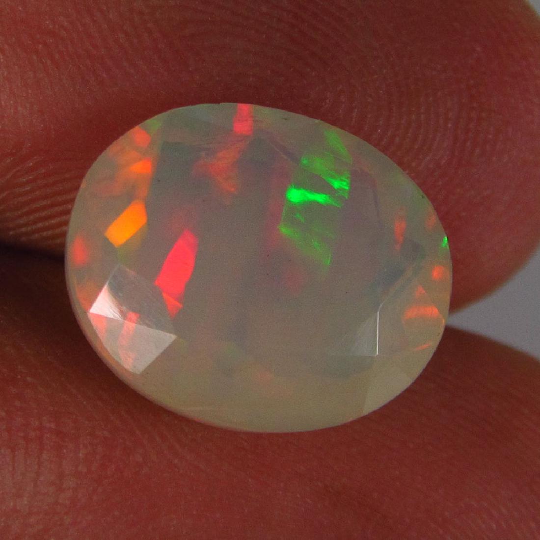3,08 ct faceted opal play of color (1 of 2)