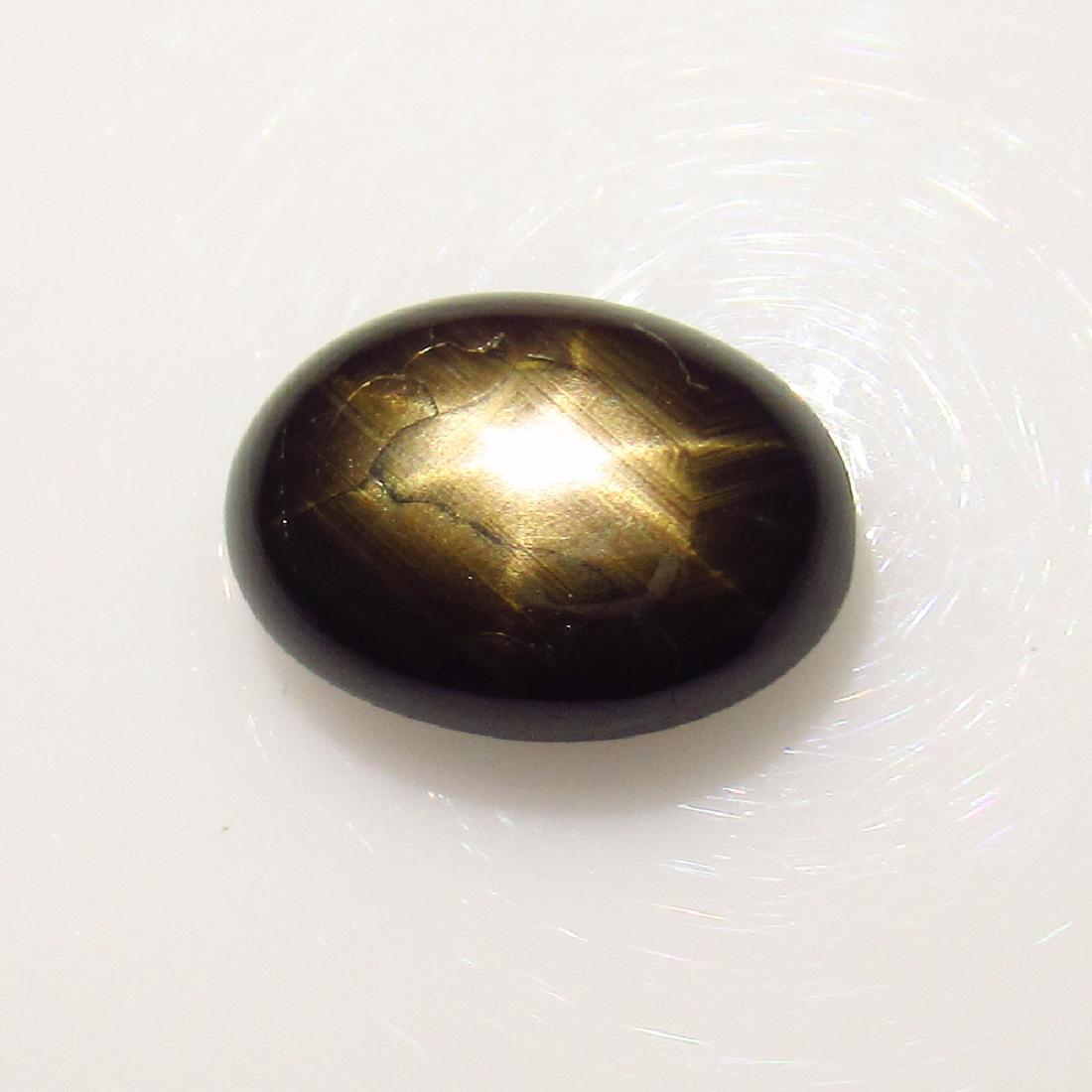 4.79 Ct Genuine Six Line Black Star Sapphire Oval Cab: No Reserve! Title: 4.79 Ct Genuine Six Line Black Star Sapphire Oval Cab Stone Clarity: Opaque Gemstones: Natural Black Star Sapphire Carat Weights: 4.79 Size/Dimensions: 11.30 x 8.00 x 4.70 mm Additi
