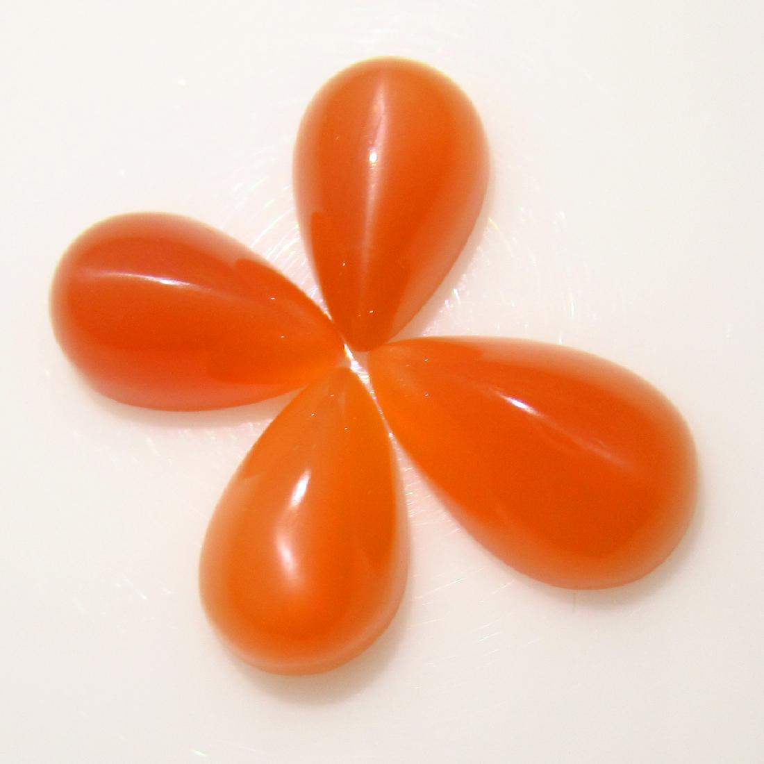 16.06 Ct Genuine 4 Orange Moonstone Pear Set: No Reserve! Title: 16.06 Ct Genuine 4 Orange Moonstone Pear Set Stone Clarity: Transparent Gemstones: Natural Moonstone Carat Weights: 16.06 Size/Dimensions: 12.2x8.1 to 14.0x9.0 mm / 4 PC's Additiona