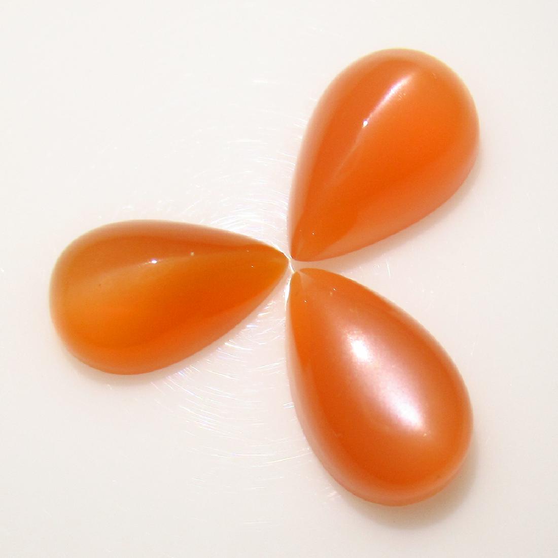 17.59 Ct Genuine 3 Orange Moonstone Pear Set: No Reserve! Title: 17.59 Ct Genuine 3 Orange Moonstone Pear Set Stone Clarity: Transparent Gemstones: Natural Moonstone Carat Weights: 17.59 Size/Dimensions: 14.10 x 9.10 to 15.20 x 10.00 mm / 3 PC's