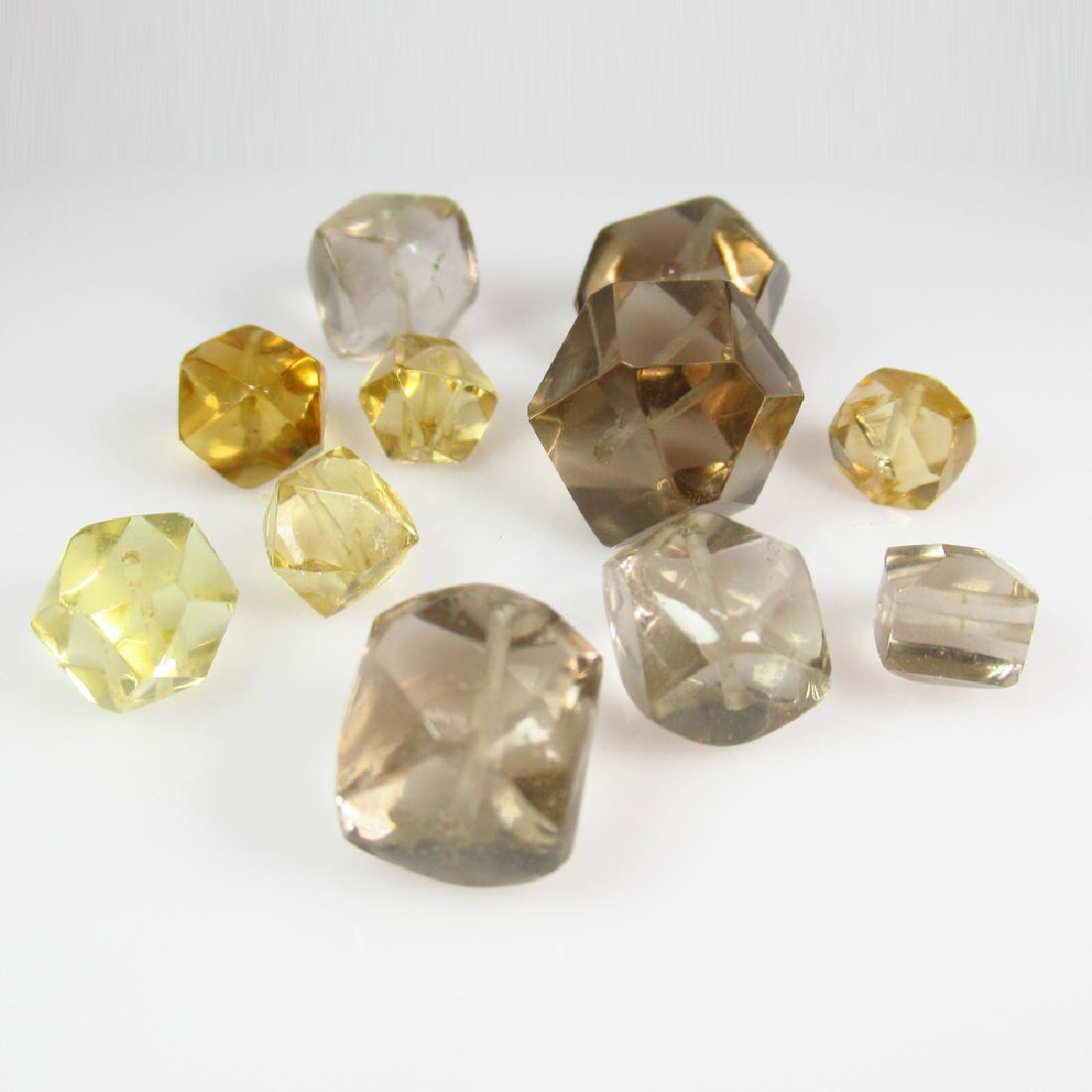 49.28 Ct Genuine Fancy Cut 11 Lemon Quartz & Smoky: No Reserve! Title: 49.28 Ct Genuine Fancy Cut 11 Lemon Quartz & Smoky Quartz Beads Stone Clarity: Transparent Gemstones: Natural Quartz Carat Weights: 49.28 Size/Dimensions: 6.3x6.0 to 13.0x12.5 mm / 