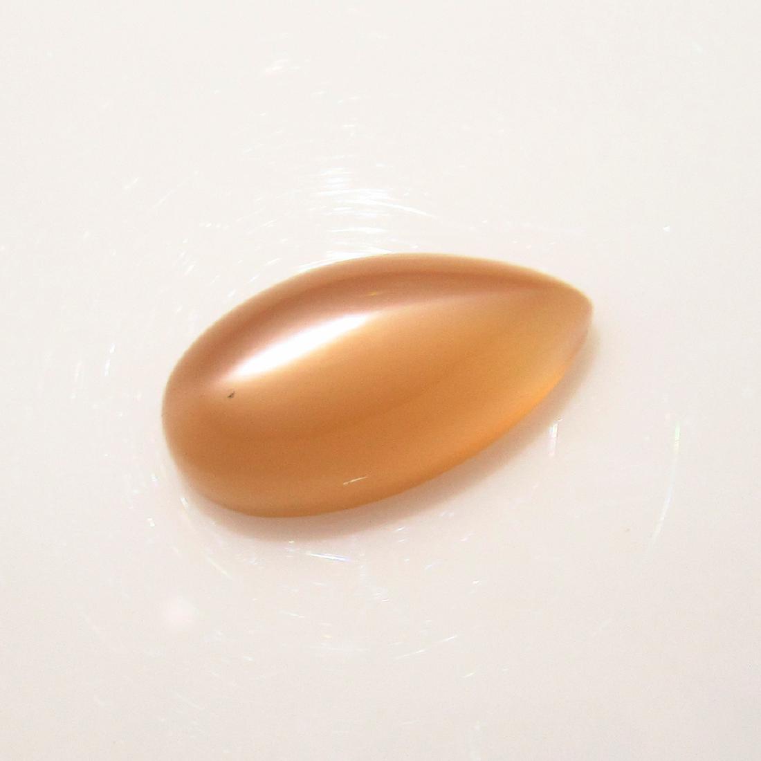 9.22 Ct Genuine Brown Moonstone Pear Cabochon: No Reserve! Title: 9.22 Ct Genuine Brown Moonstone Pear Cabochon Stone Clarity: Transparent Gemstones: Natural Moonstone Carat Weights: 9.22 Size/Dimensions: 17.20 x 8.60 x 8.20 mm Additional Informat