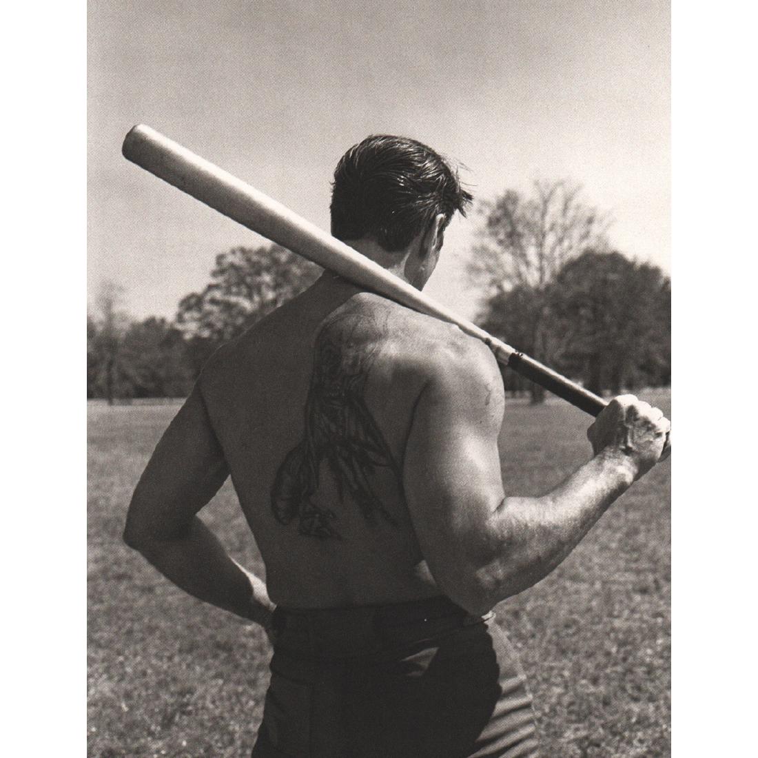 BRUCE WEBER - Huntsville Prison Baseball Player, Texas: Artist: BRUCE WEBER Print Title: Huntsville Prison Baseball Player, Texas 1984 Medium: Sheet-fed Gravure Printing Date: 1980's Printed in Spain Image Size approx: 8.5 X 11 inches Bruce Weber is an Ame