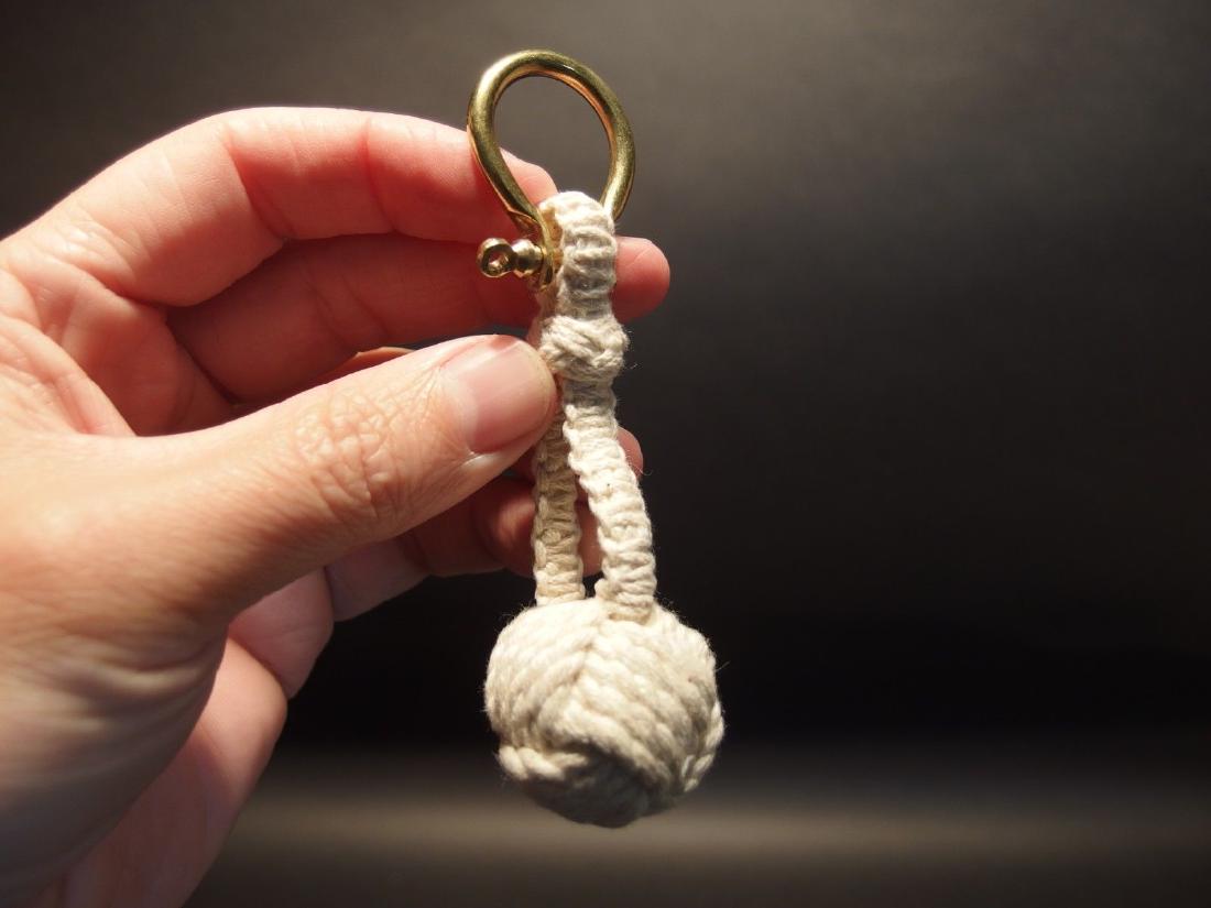 Marine Sailor's Monkey Fist sailor rope knot Keychain: 4 1/2" Long Wonderful well made sailors knot monkey fist keychain. Reserve: $5.00 Shipping: Domestic: Flat-rate of $5.00 to anywhere within the contiguous U.S. International: Foreign shipping rates ar
