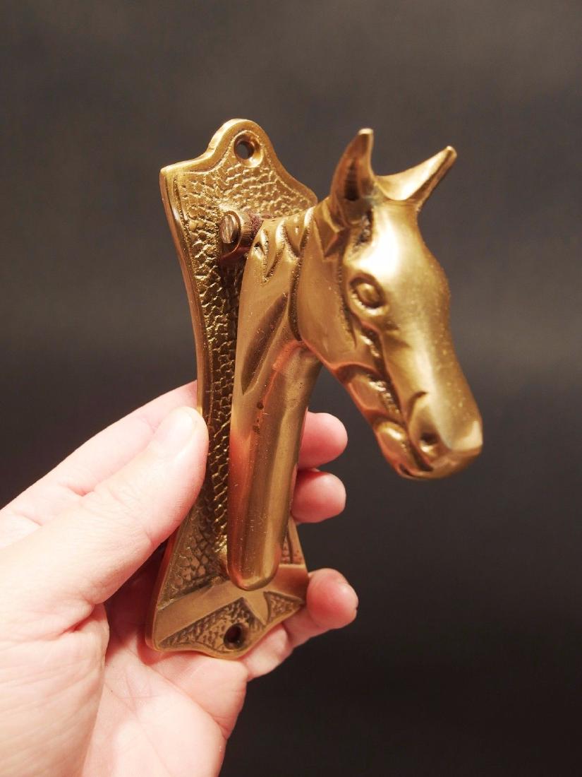 BRASS Horse Head DOOR KNOCKER Hardware: 5 7/8" Tall x 2" Wide x 3" ExtensionGreat reproduction horse head door knocker cast from an antique. Really great authentic looking detail and slight antique patina. This piece is in natural brass so 