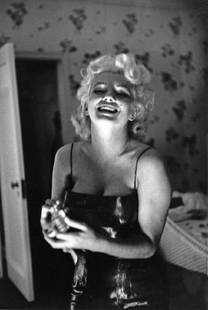 Marilyn Getting Ready To Go Out: Artist: Ed Feingersh Title: Marilyn Getting Ready To Go Out Medium: Silver Gelatin Year: 1955 Height/Width: 12 x 10 in Description: Actress Marilyn Monroe gets ready to go see the play ‘Cat On A Hot