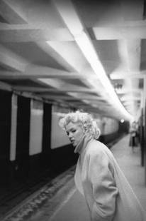 Marilyn In Grand Central Station: Artist: Ed Feingersh Title: Marilyn In Grand Central Station Medium: Silver Gelatin Year: 1955 Height/Width: 20 x 16 in Description: Actress Marilyn Monroe takes the subway in Grand Central Station