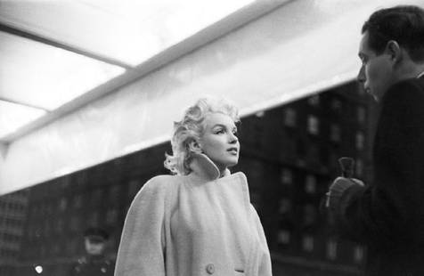 Marilyn In Grand Central Station: Artist: Ed Feingersh Title: Marilyn In Grand Central Station Medium: Silver Gelatin Year: 1955 Height/Width: 12 x 16 in Description: Actress Marilyn Monroe takes the subway in Grand Central Station