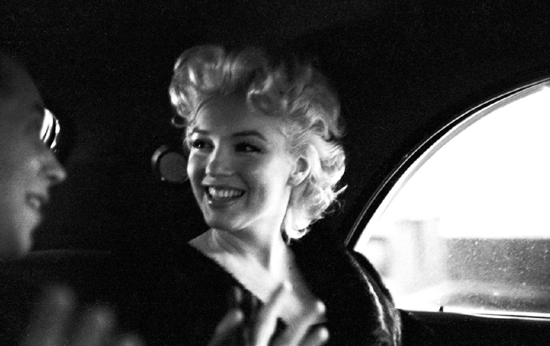 Marilyn In New York Taxi Cab: Artist: Ed Feingersh Title: Marilyn In New York Taxi Cab Medium: Silver Gelatin Year: 1955 Height/Width: 12 x 16 in Description: Actress Marilyn Monroe rides in the back of a car with Dick Shepherd on