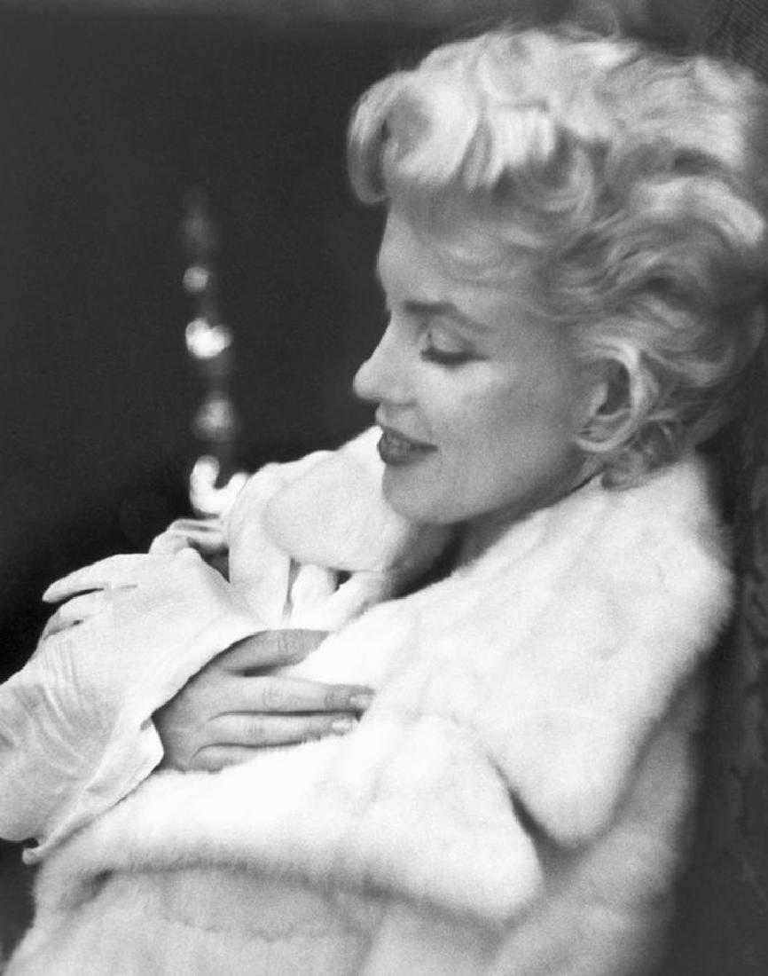Marilyn Resting: Artist: Ed Feingersh Title: Marilyn Resting Medium: Silver Gelatin Year: 1955 Height/Width: 20 x 16 in Description: Actress Marilyn Monroe rests her eyes wearing a white fur coat on March 24, 1955 in