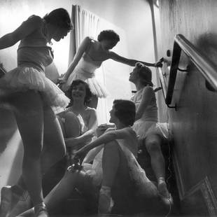 Between Shows: Artist: Bert Hardy Title: Between Shows Medium: Silver Gelatin Year: 1950 Height/Width: 12 x 12 in Description: 3rd February 1950: Dancers backstage between shows at Ciro’s Club on Orange Street,