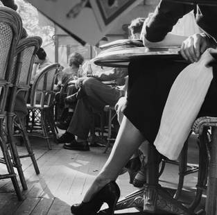 Elegant Ankle: Artist: Bert Hardy Title: Elegant Ankle Medium: Silver Gelatin Year: 1951 Height/Width: 30 x 30 in Description: Customers sitting on the terrace of a cafe on the Champs-Elysees, Paris, June 1951.