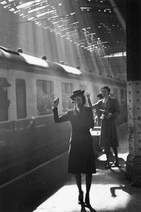 Goodbye: Artist: Bert Hardy Title: Goodbye Medium: Silver Gelatin Year: 1942 Height/Width: 16 x 12 in Description: Tearful wives waving goodbye as a troop train pulls out of a station. Original Publication: