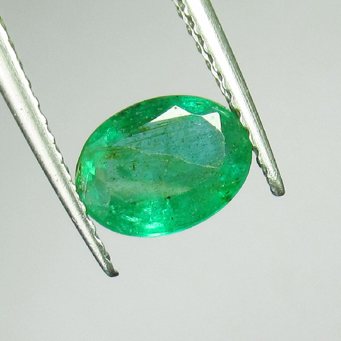 0.86 Ct Genuine Zambian Emerald 7.5X5.5 mm Oval Cut (1 of 2)