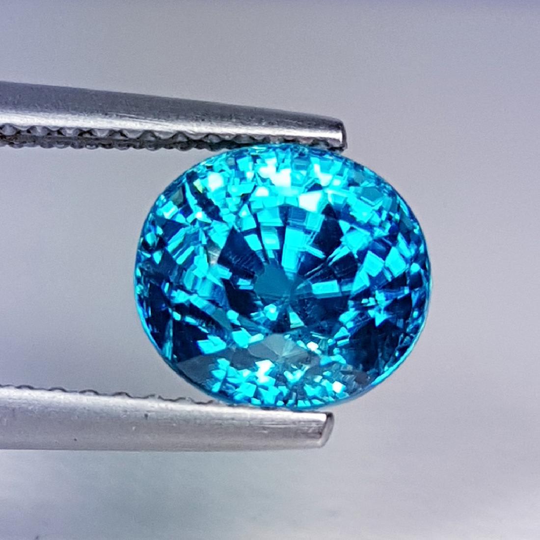 4.45 ct Natural Blue Zircon: Title: 4.45 ct Natural Blue Zircon Brand: Blue Zircon Gemstones: Loosegemstone Color/Clarity: VVS Carat Weights: 4.45 Size/Dimensions: 8.10 x 7.40 x 7.10 Additional Information: Oval - Cambodia Reserv