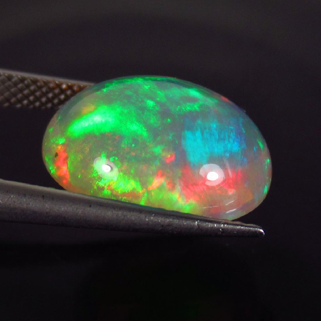 6.46 Ct Genuine Ethiopian Multi-Color Fire Opal Oval (1 of 2)