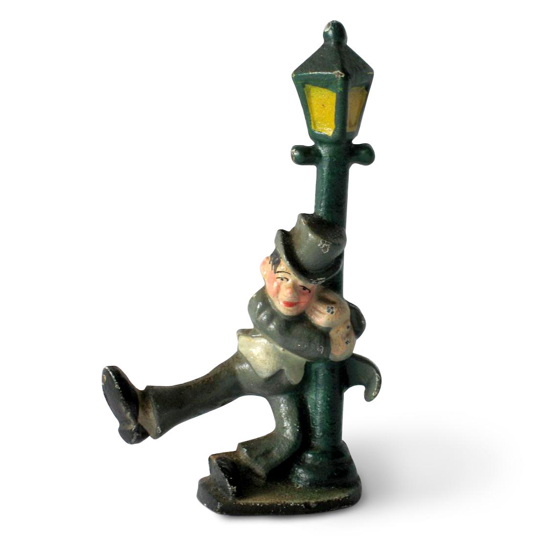 Cast iron “drunk at the lamp post” bottle opener. (1 of 3)