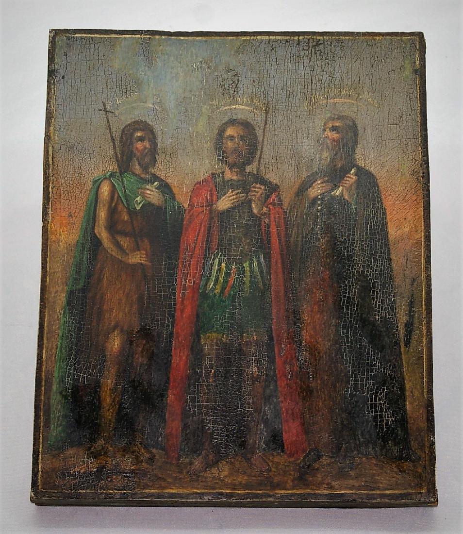 Antique icon of the three saints: St. John the Baptist,: Title: Antique icon of the three saints: St. John the Baptist, Saint Alexander Nevsky, Saint Michael Date: The end of the 19th century. Origin: Icon workshop Kievo - Pechersk Lavra Material: Wood, pai