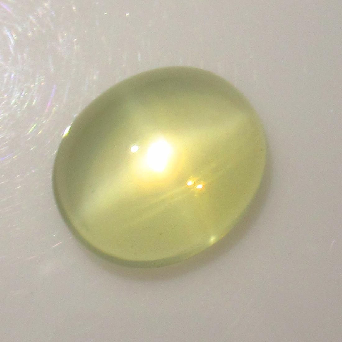 5.63 Ct Genuine Moonstone Catseye 13.5X11.5 mm Oval Cab: No Reserve! Title: 5.63 Ct Genuine Moonstone Catseye 13.5X11.5 mm Oval Cab Stone Clarity: Transparent Gemstones: Natural Moonstone Catseye Carat Weights: 5.63 Size/Dimensions: 13.60 x 11.50 x 5.00 mm