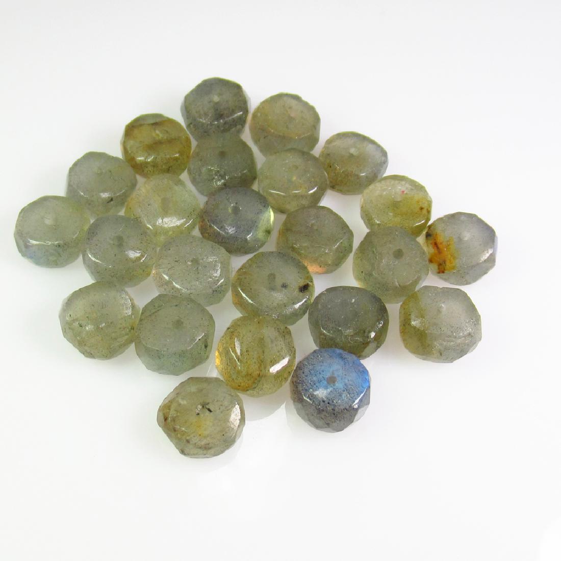 55.80 Ctw Natural 24 Labradorite Drilled Round Beads: No Reserve! Title: 55.80 Ctw Natural 24 Labradorite Drilled Round Beads Stone Clarity: Transparent Gemstone: Labradorite Beads Carat Weights: 7.60 to 8.30 mm / 24 PC's Size/Dimensions: 55.80 Excellent