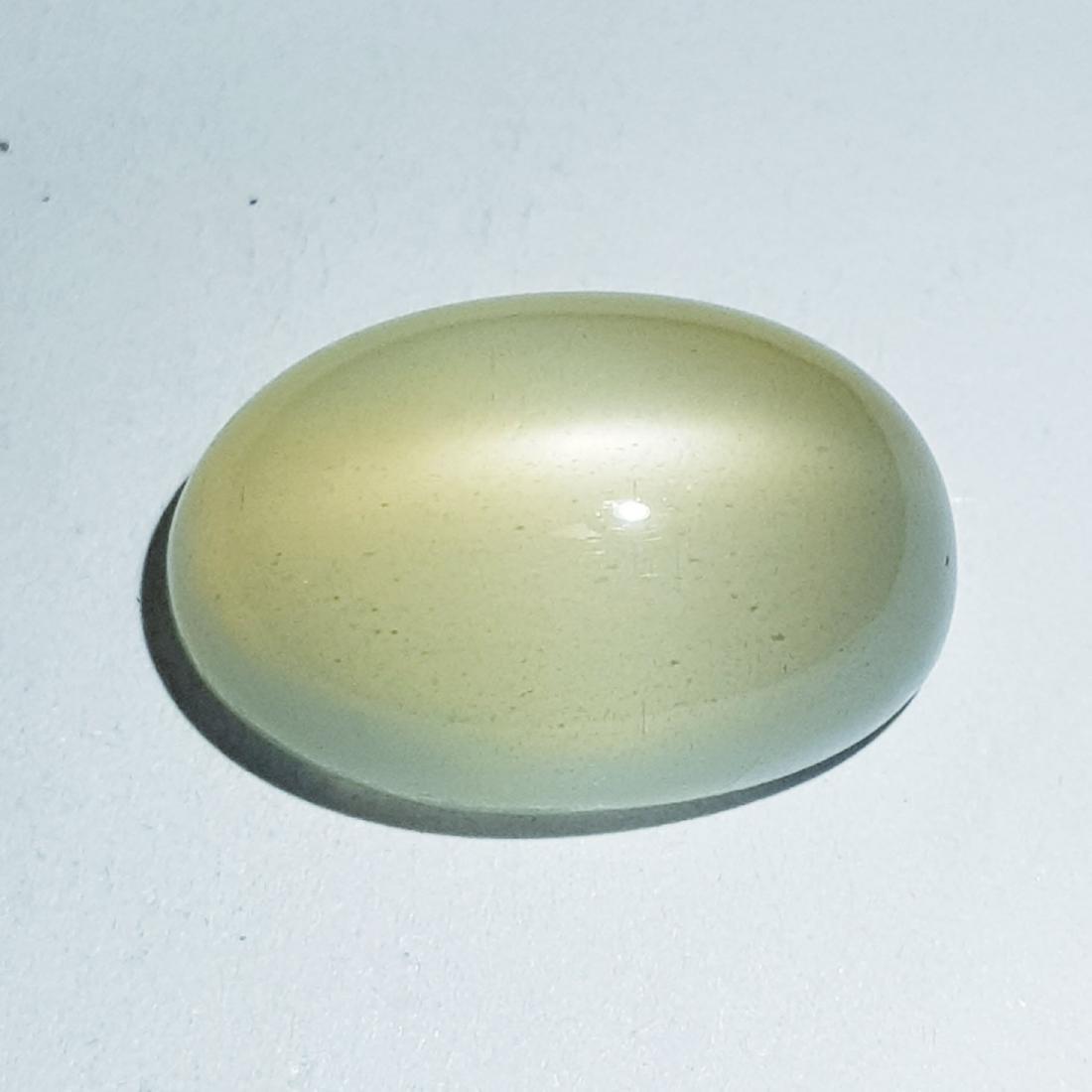 13.05 ct Natural Orange Moonstone: No Reserve! Title: 13.05 ct Natural Orange Moonstone Color/Clarity: Semi -Transparent Gemstones: Loosegemstone Carat Weights: 13.05 Size/Dimensions: 18.20 x 12.20 x 8.00 Additional Information: Oval -