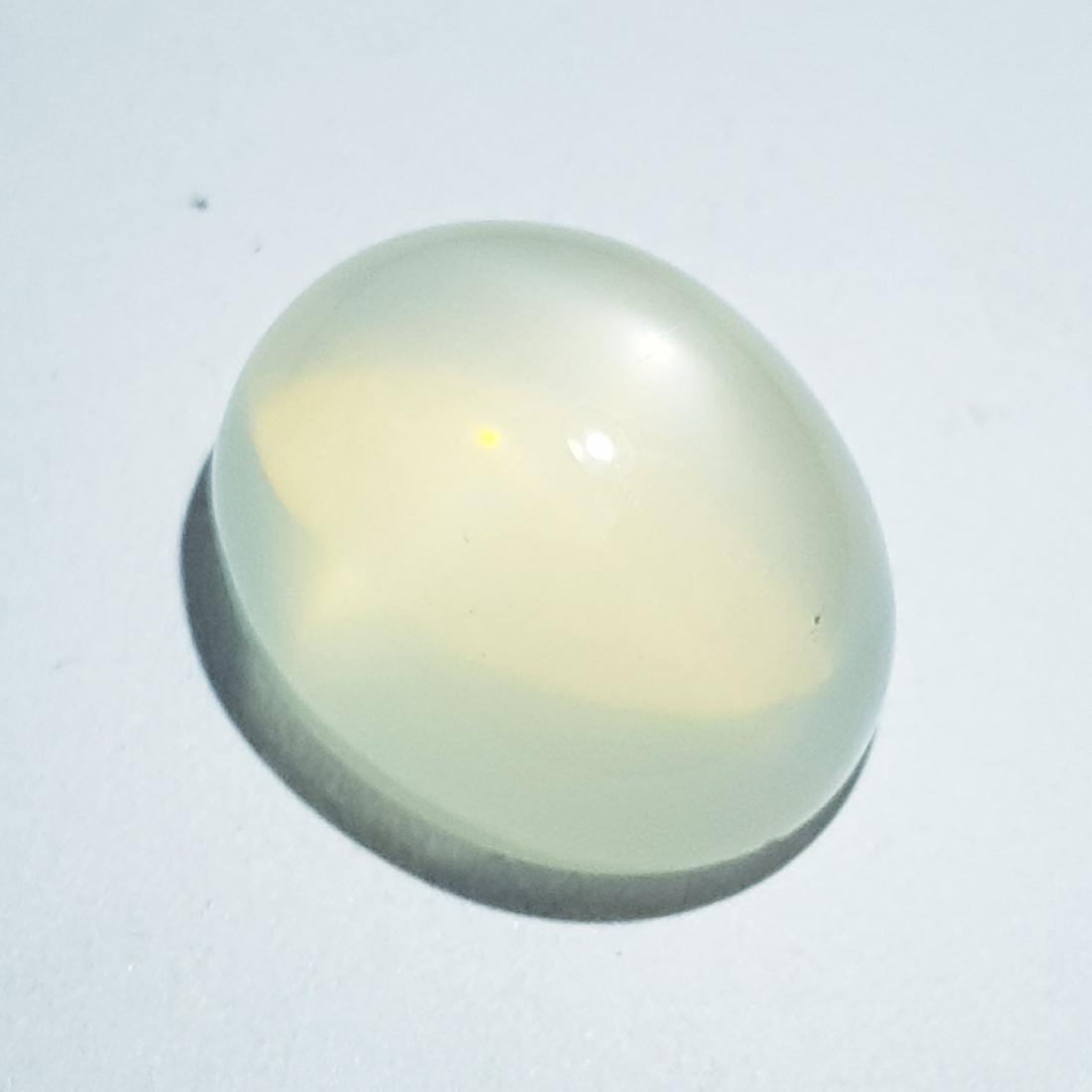 12.55 ct Natural Orange Moonstone: No Reserve! Title: 12.55 ct Natural Orange Moonstone Color/Clarity: Semi -Transparent Gemstones: Loosegemstone Carat Weights: 12.55 Size/Dimensions: 15.80 x 13.80 x 8.60 Additional Information: Oval -