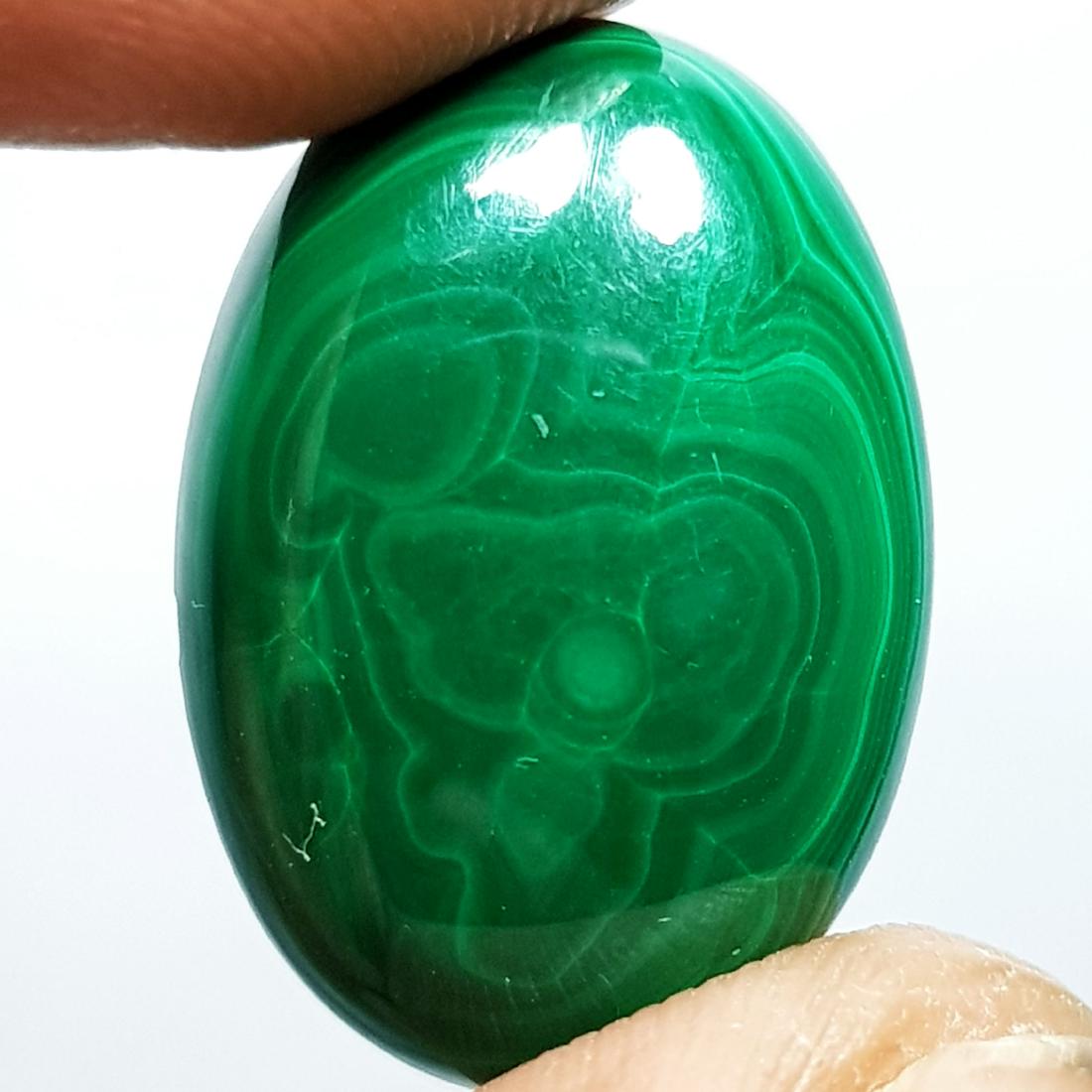 14.10 ct Natural Malachite: No Reserve! Title: 14.10 ct Natural Malachite Color/Clarity: IF - VVS Loose gemstone Carat Weights: 14.1 Size/Dimensions: 19.45 x 13.80 x 4.60 Oval - Africa Shipping: Worldwide: Flat-rate of $10.00 to