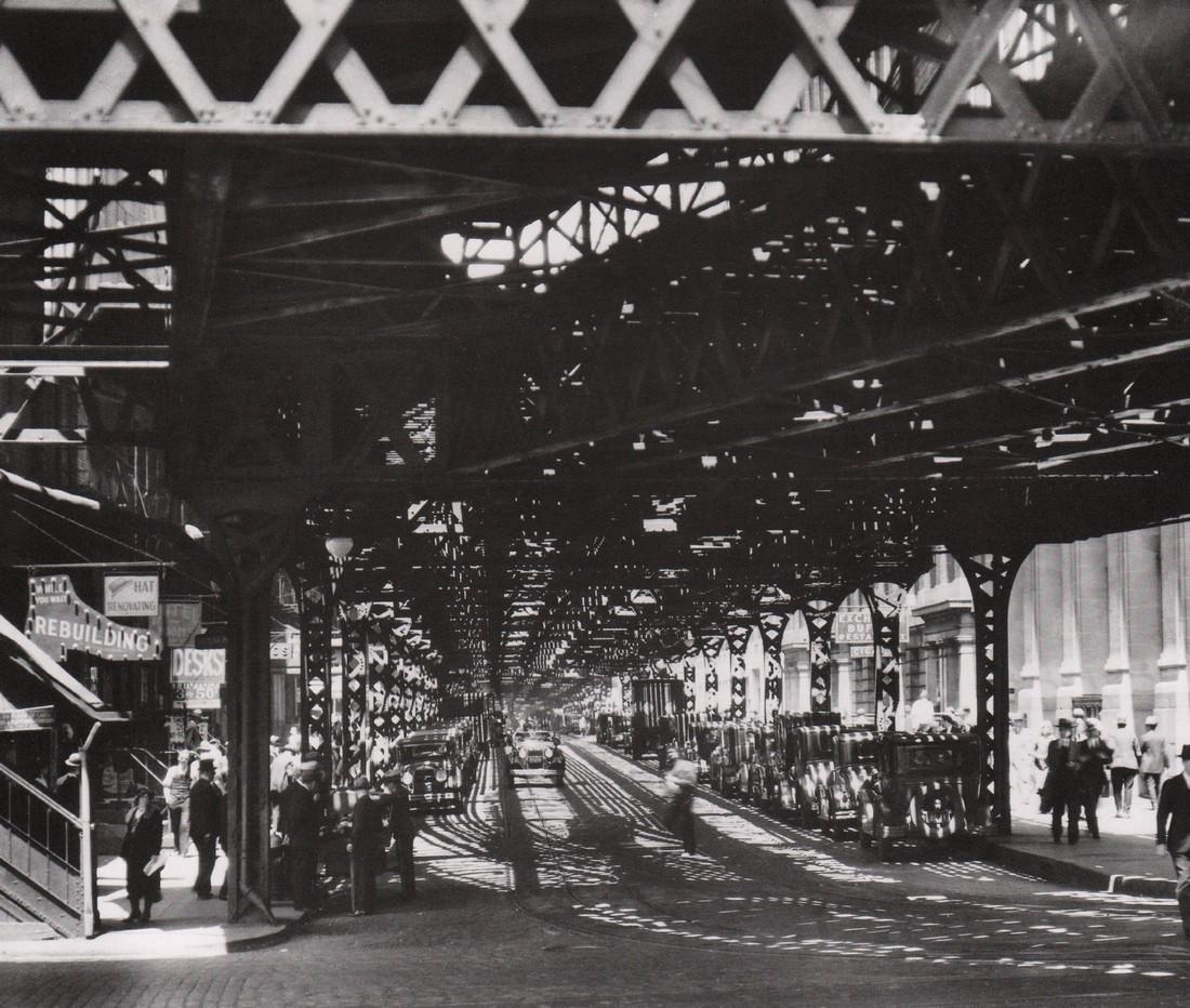 BERENICE ABBOTT- Under the El at Battery, 1932: Artist: BERENICE ABBOT Print Title: Under the El at Battery, 1932 Medium: Photo-lithograph Printed in: Japan, 1982 Image Size: approx. 7.5 x 9.5” Berenice Abbott (1898 – 1991),was an American phot