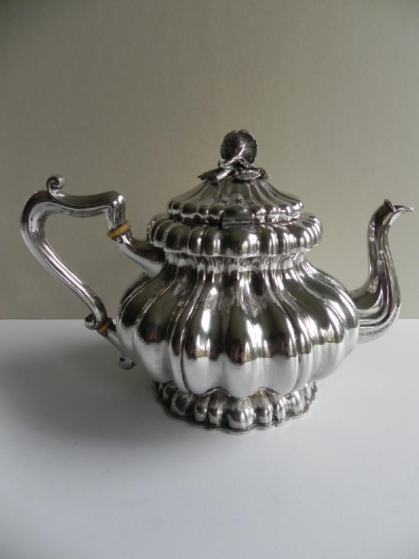 Silver coffee pot 35.17 Oz: Title: Silver coffee pot 35.17 Oz Category: Dec Arts Maker: unknown Origin:Austria Date/Period: 1875-1900 Materials: Silver 800 weight 35.17 Oz Dimensions: 7.5x6.69x11.42 inch Description: Elegant, he