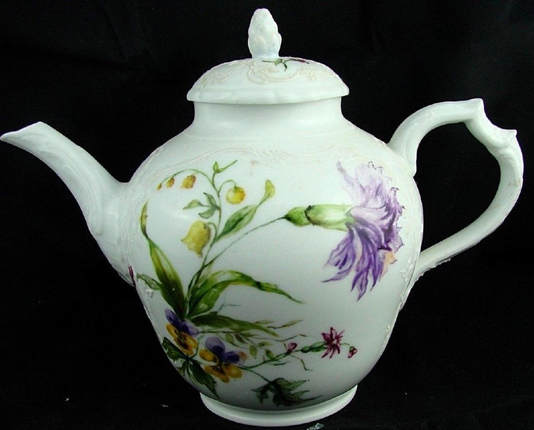 18thC KPM Berlin Porcelain Teapot, Flower Decoration.: Title: 18thC KPM Berlin Porcelain Teapot, Flower Decoration. 1763-1780 Additional Information: An early KPM Berlin porcelain teapot, plain white ground with relief decoration and hand painted front an