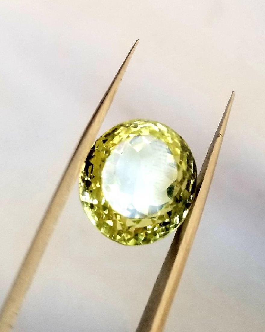 15 Carats Supreme Quality Lemon Yellow Natural Citrine: Title: 15 Carats Supreme Quality Lemon Yellow Natural Citrine Quartz Origin: Pakistan Weight: 15 carats Additional Information: 15 Carats Supreme Quality Lemon Yellow Natural Citrine Quartz Reserve: