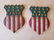 PAIR OF AMERICAN SHIELDS RED, WHITE AND BLUE