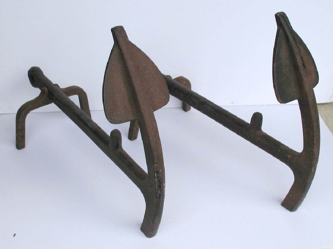 Cast iron anchor fireplace andirons.: Title: Cast iron anchor fireplace andirons. Date: 1940's Dimensions: 20 1/2” x 15” Provenance/Additional Information: Nice pair of vintage New England cast iron fireplace andirons. Shipping: Domes