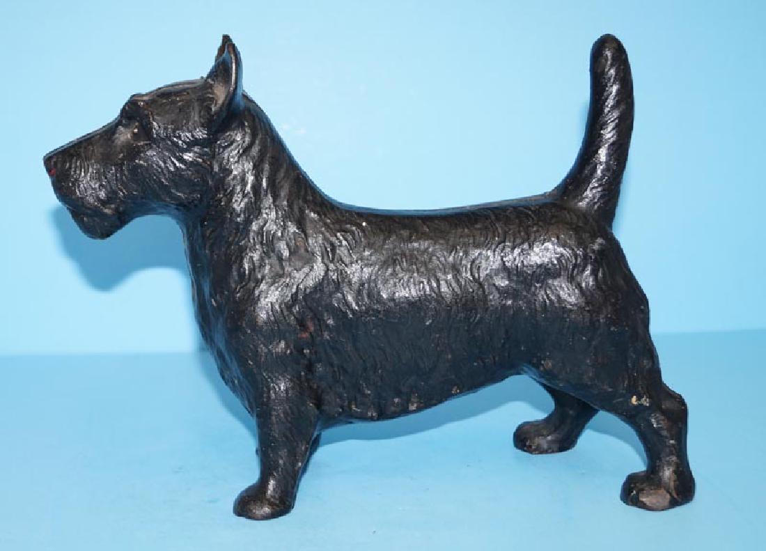 Scottie Terrier Dog Cast Iron Hubley Doorstop: Title: Scottie Terrier Dog Cast Iron Hubley Doorstop Date: Circa 1930's. Dimensions: 7 3/4" tall x 10 1/2" long Provenance/Additional Information: Antique Cast Iron Full-Figure Scottie, Scottish Terri