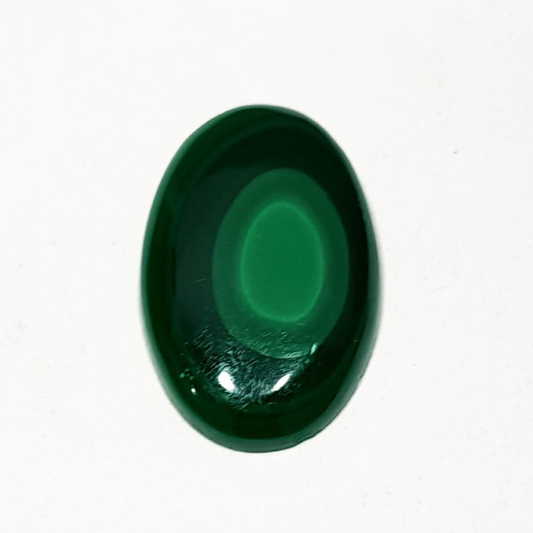 6.85 ct Natural Malachite: No Reserve! Title: 6.85 ct Natural Malachite Color/Clarity: Opaque Gemstones: Loosegemstone Carat Weights: 6.85 Size/Dimensions: 17.60 x 11.05 x 2.95 Additional Information: Oval - Africa Shipping: W