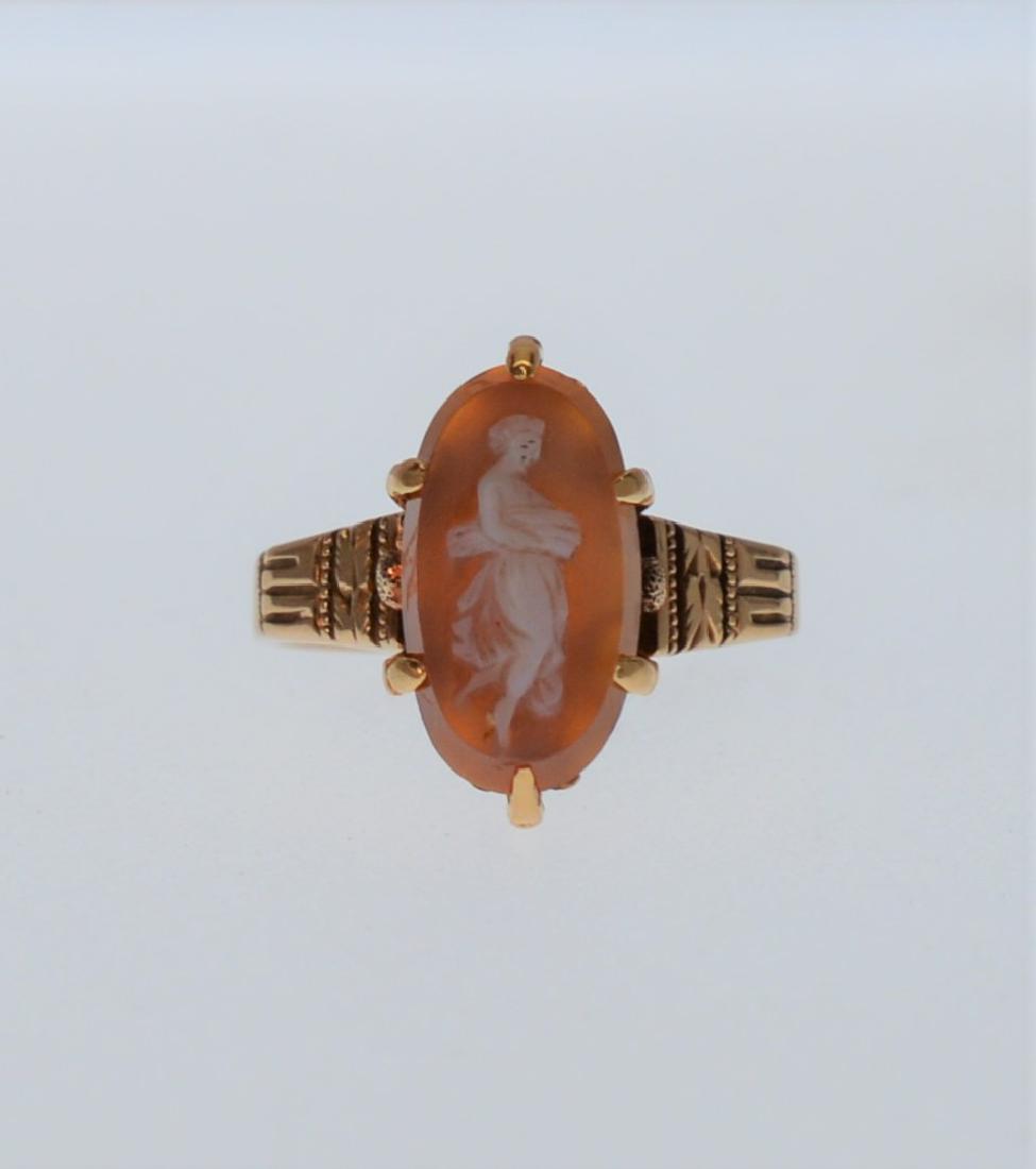 Antique 14K Yellow Gold Handcarved Cameo Ring: Title: Antique 14K Yellow Gold Handcarved Cameo Ring Metal Purity: 14K Size/Dimensions: Size 7 Additional Information: Handcrafted 14K Yellow Gold Ring with Antique Setting featuring a Shell carved Ca
